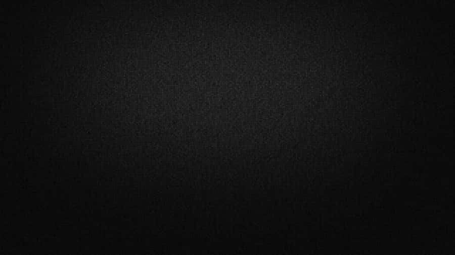 A Black Background With A Light Shining On It Wallpaper