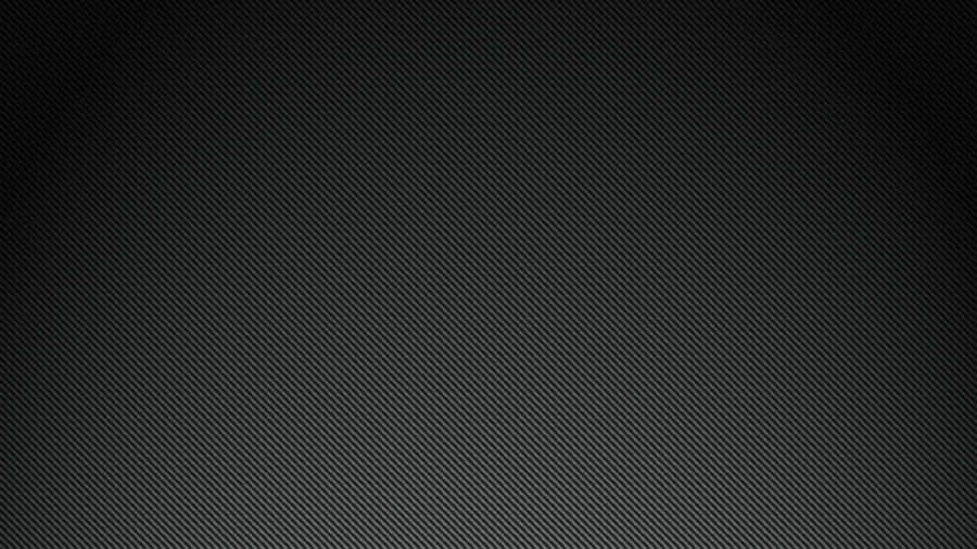 A Black Background With A Light Texture Wallpaper