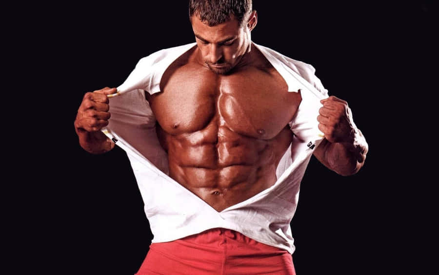 A Breathtaking Sunrise Over The Ocean Wallpaper