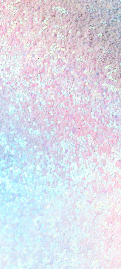 A Breathtaking Sunset Overlooking The Snow-covered Mountains Wallpaper