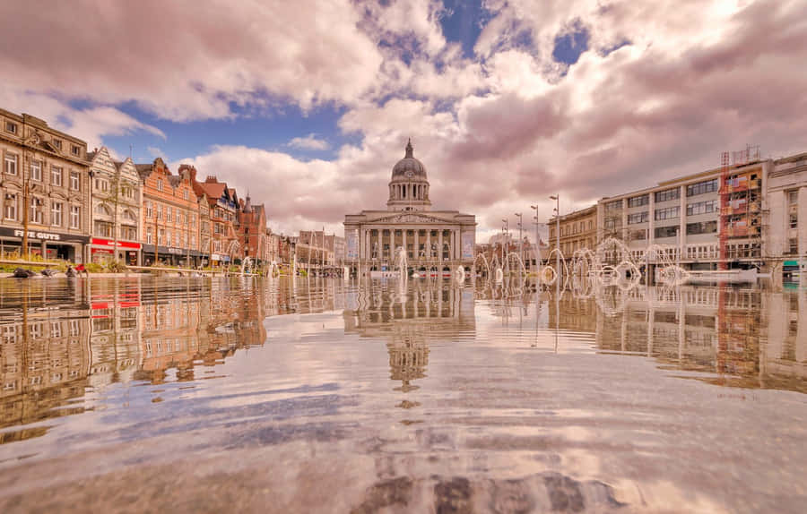 A Breathtaking View Of Nottingham Cityscape At Sunset. Wallpaper