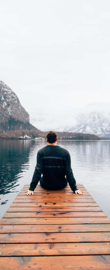 A Broken City Skyline With The Sun Setting In The Background Wallpaper