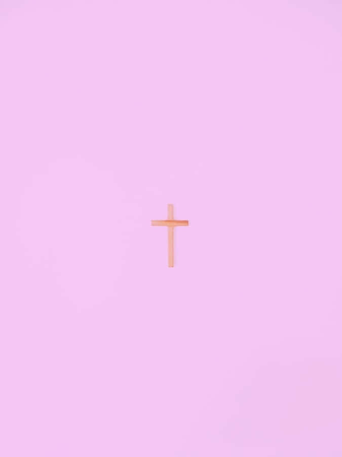 A Christian Cross Against A Brighter Background Wallpaper