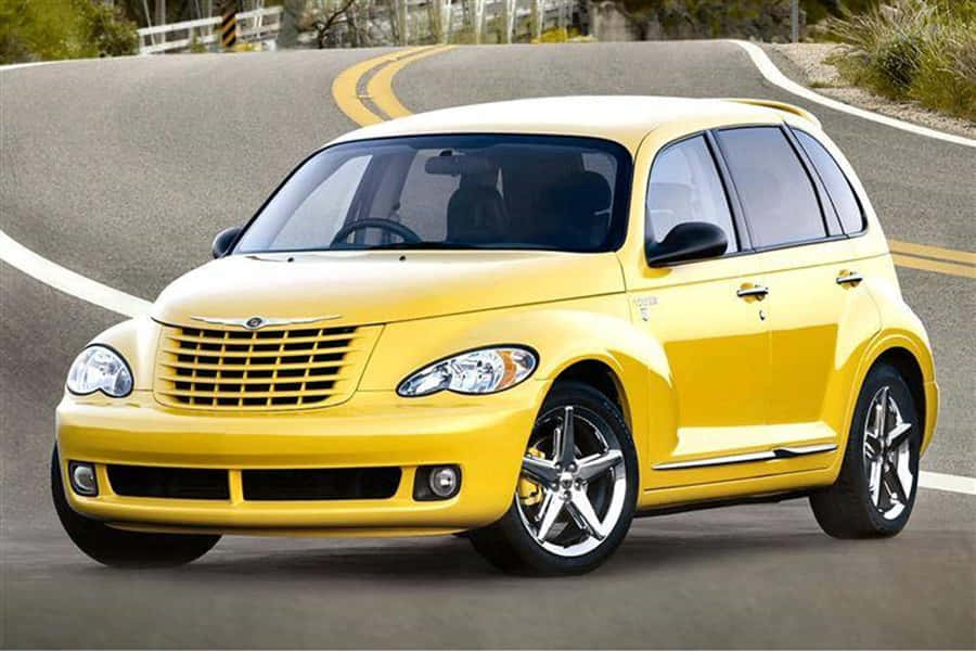 A Chrysler Pt Cruiser On A Scenic Journey Wallpaper