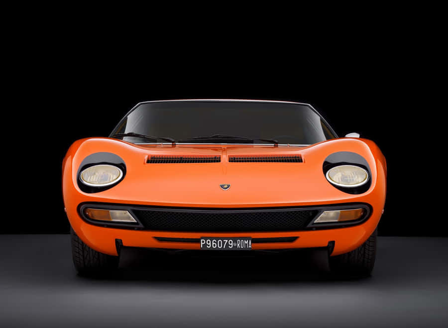 A Classic Lamborghini Miura In Stunning Orange Wallpaper