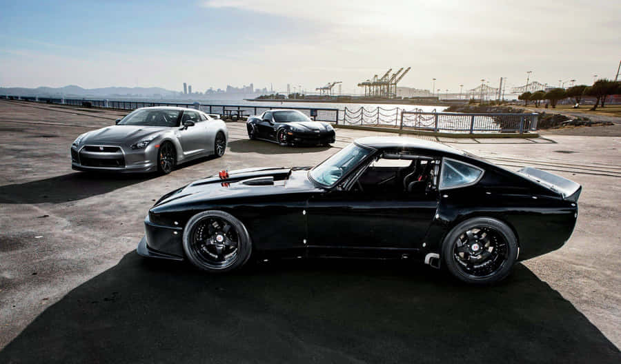 A Classic Red Datsun On The Open Highway. Wallpaper