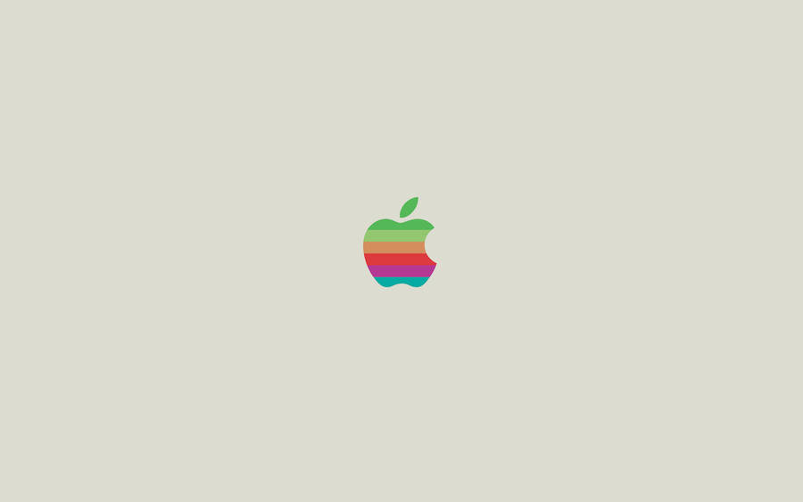 A Colorful Macbook Featuring The Iconic Logo Wallpaper