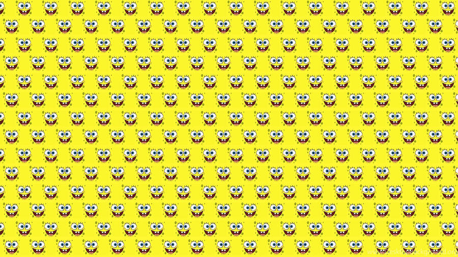 A Computer With A Minimalistic Yellow Aesthetic. Wallpaper