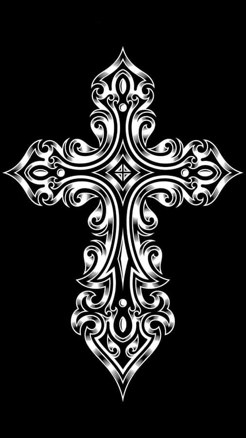 A Cross With An Ornate Design On A Black Background Wallpaper