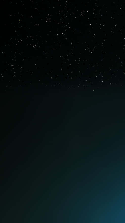 A Dark Blue Star Shining Brightly In The Night Sky Wallpaper
