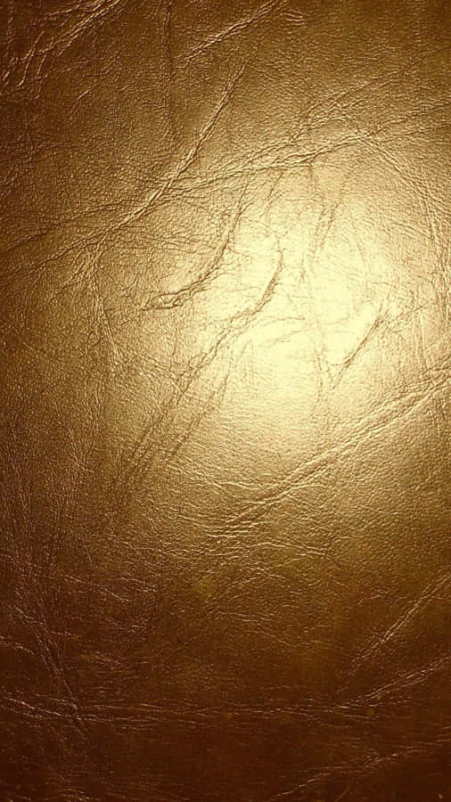 A Deep And Reflective Metallic Gold To Add A Sense Of Sophistication And Elegance To Any Setting. Wallpaper