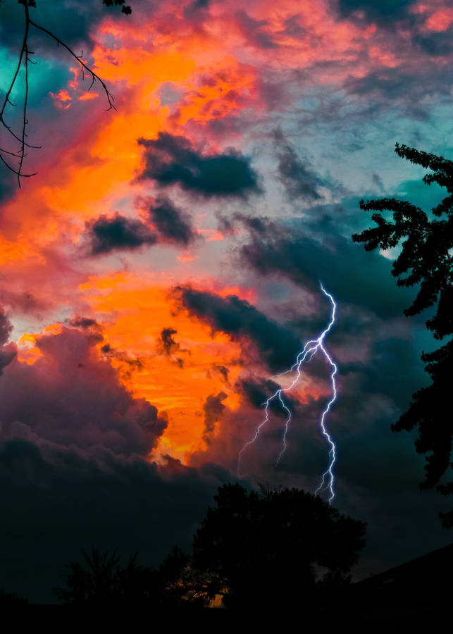 A Flash Of Lightning In The Twilight Sky Wallpaper