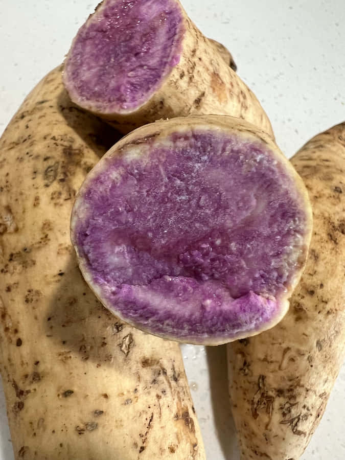 A Freshly Harvested Purple Sweet Potato Wallpaper