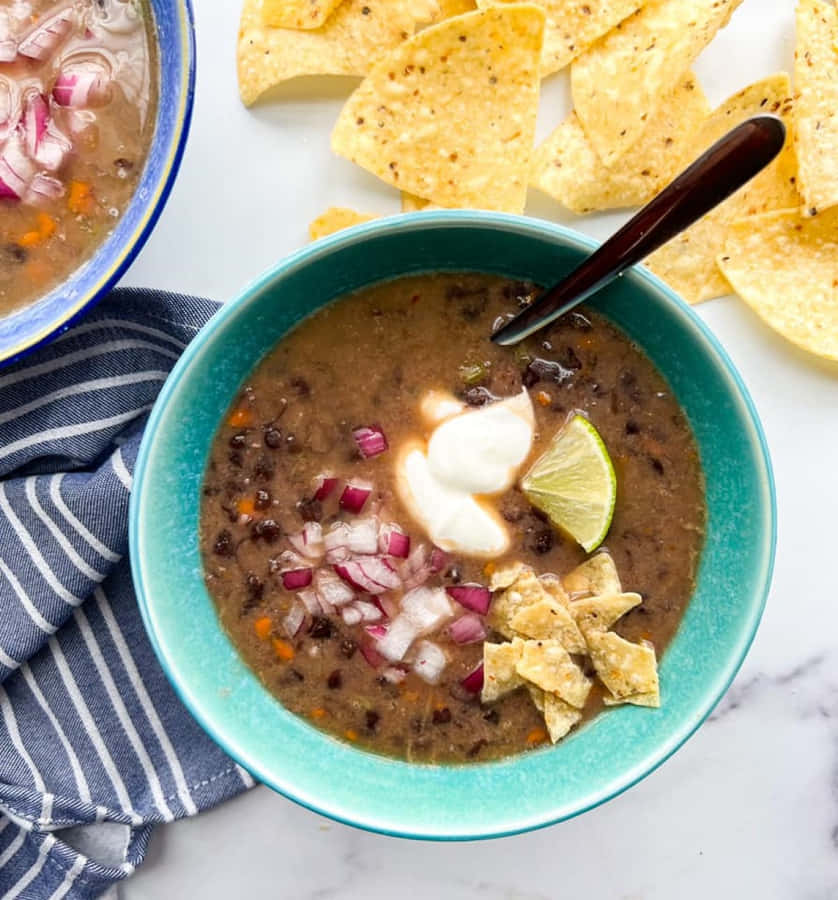 A Freshly Made Bowl Of Black Bean Soup Wallpaper