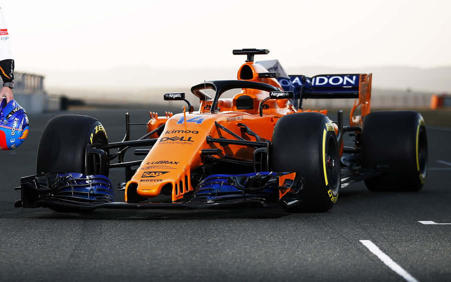 A Glimpse Of The Mclaren Team During The 2021 Formula 1 Season Wallpaper