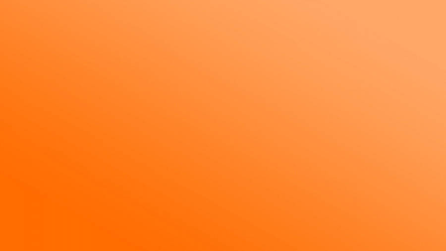 A Glowing Orange Sunrise Wallpaper