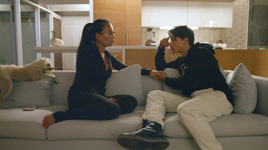 A Group Photo Of The Bling Empire Cast In A Glamorous Setting Wallpaper