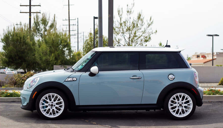 A Happy Family Enjoying A Road Trip In Their Spacious Car Wallpaper