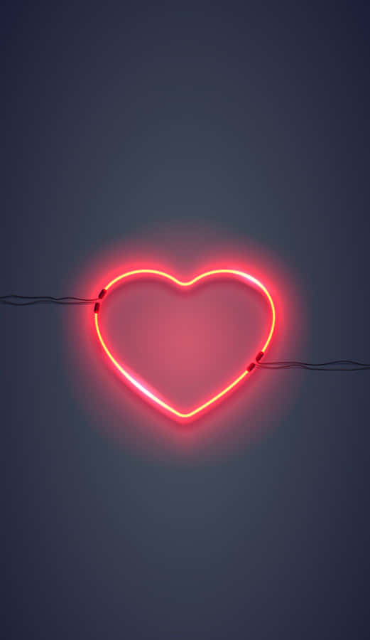 A Heart Neon Sign On A Dark Background Wallpaper