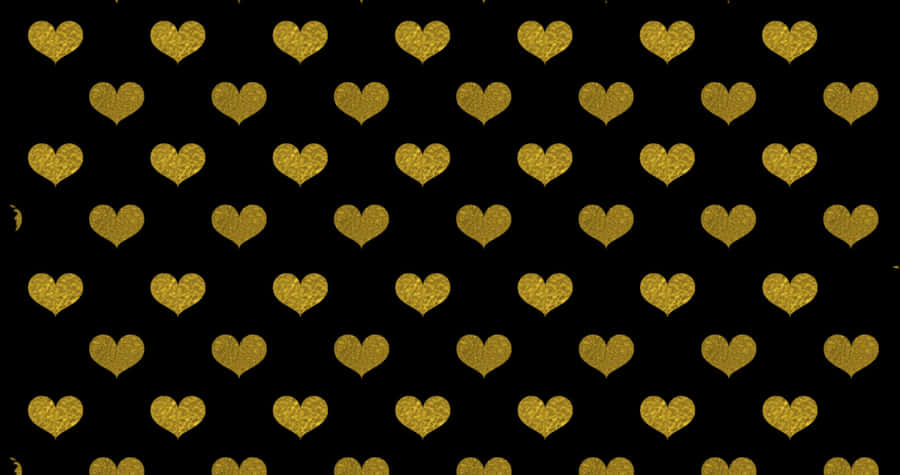 A Lone Tree On A Rocky Beach Near The Edge Of A Lake. Wallpaper