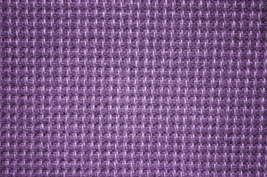 A Luxe Rolley Of Purple Fabrics Adds A Touch Of Elegance To Any Space Wallpaper