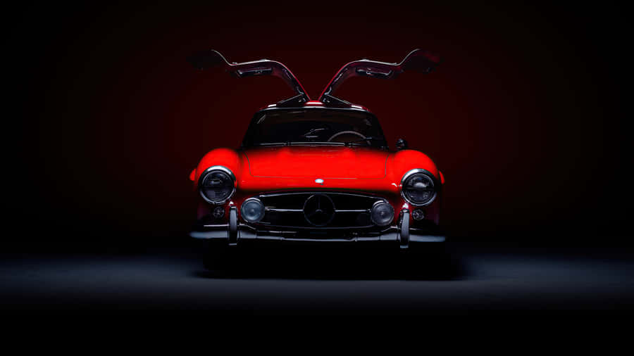 A Magnificent Mercedes Benz Car Is Glistening In The Sun. Wallpaper