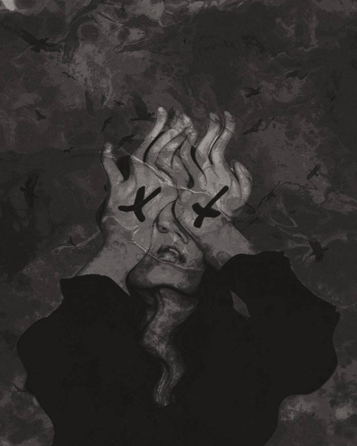 A Man Sits, Deep In Thought And Feeling A Sad Emotion Wallpaper