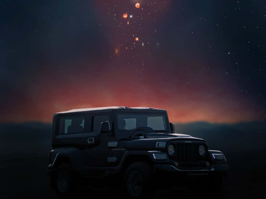 A Mesmerizing Aerial View Of A Desert Landscape Wallpaper