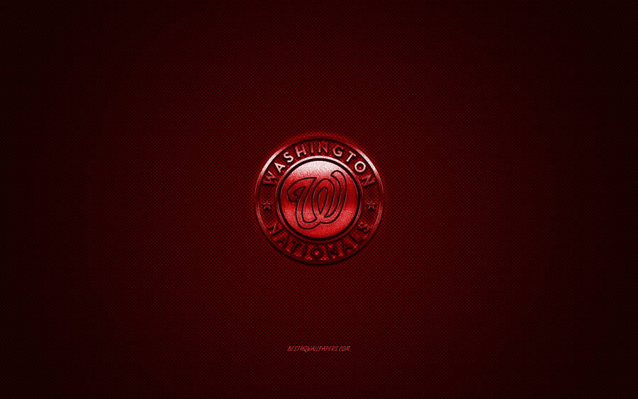 A Passionate Moment Of Teamwork In A Washington Nationals Game Wallpaper