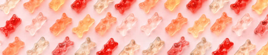 A Pattern Of Orange And Red Colored Liquids Wallpaper