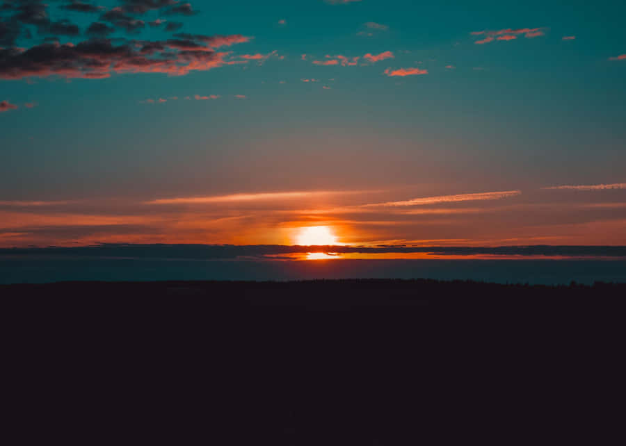 A Picture Of A Tranquil Beach, Perfect For A Relaxing Vacation Wallpaper