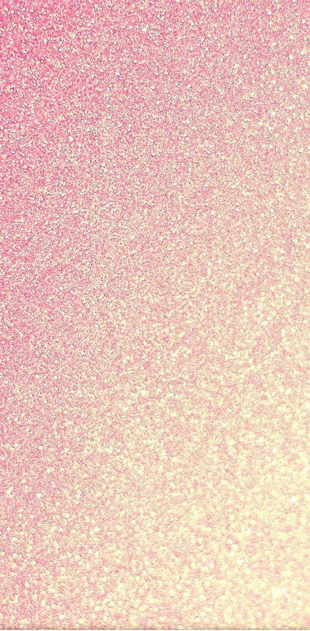 A Pink And Gold Glittery Background Wallpaper