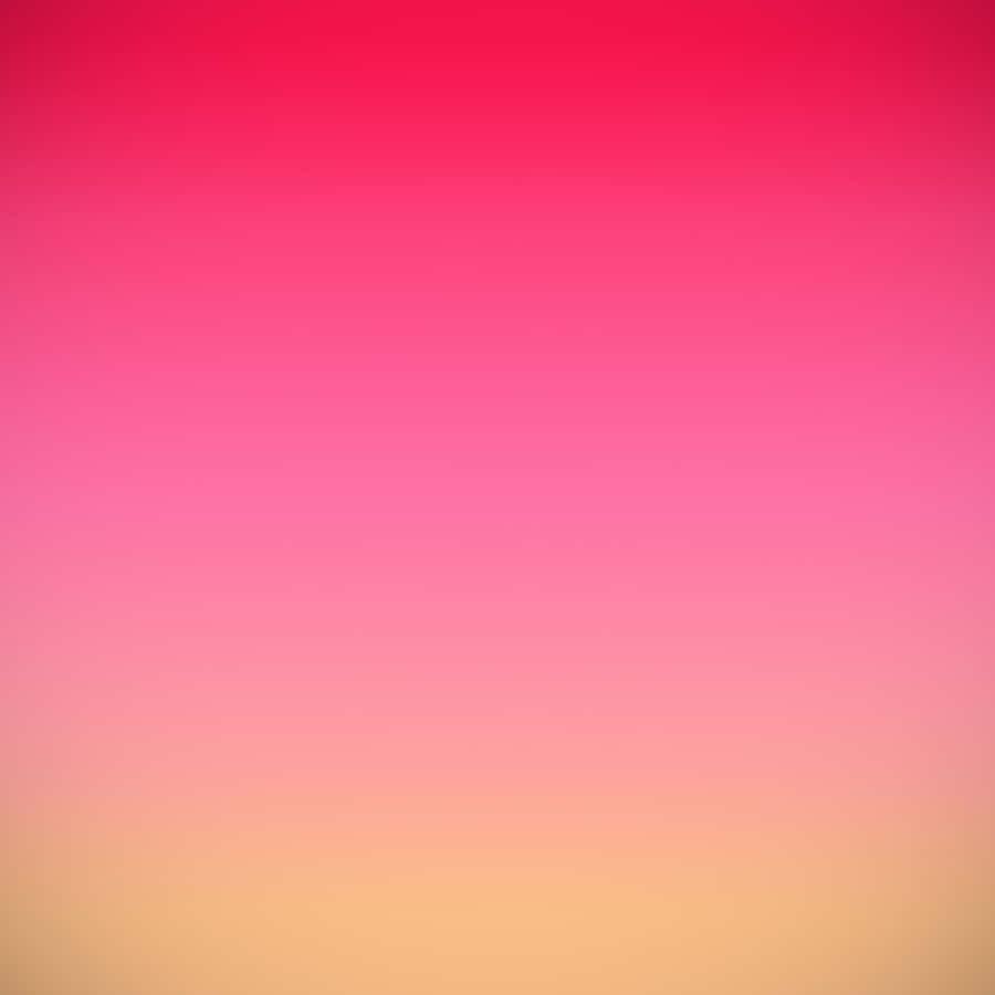 A Pink And Yellow Gradient Background Wallpaper
