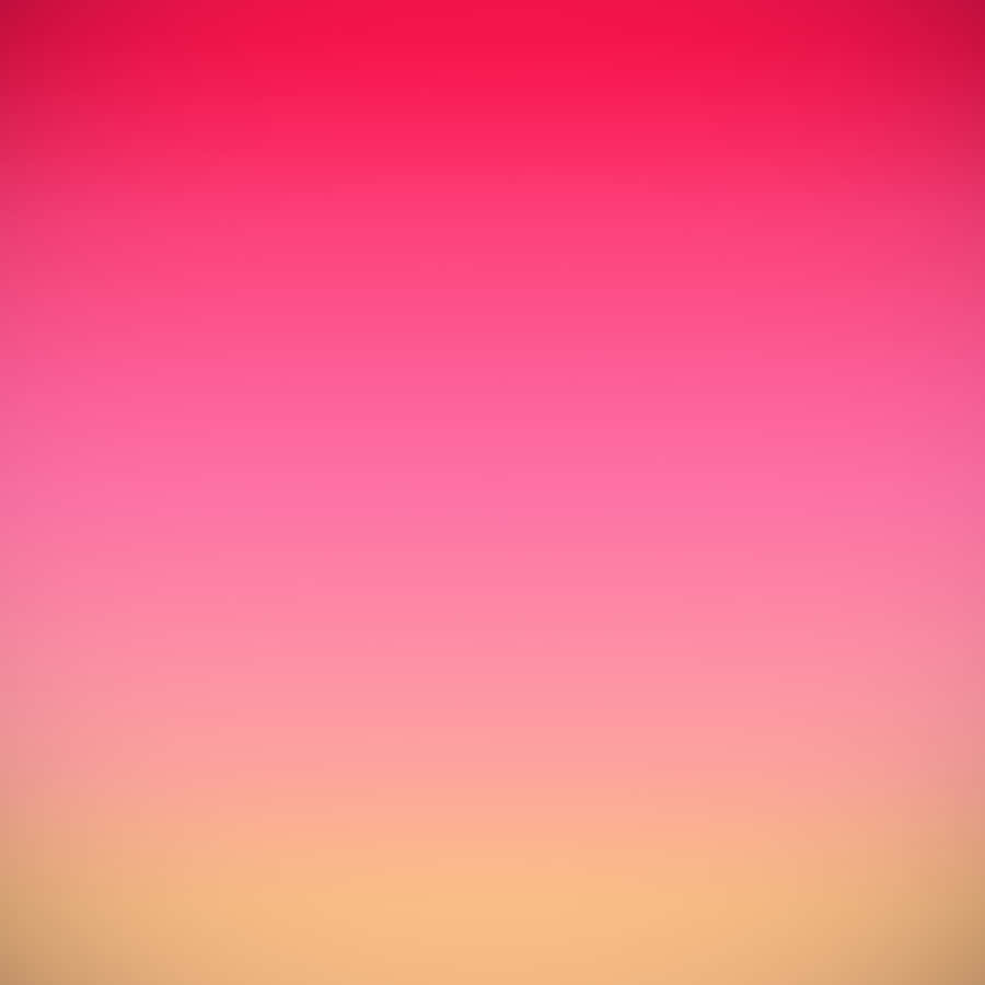 A Pink And Yellow Gradient Background Wallpaper