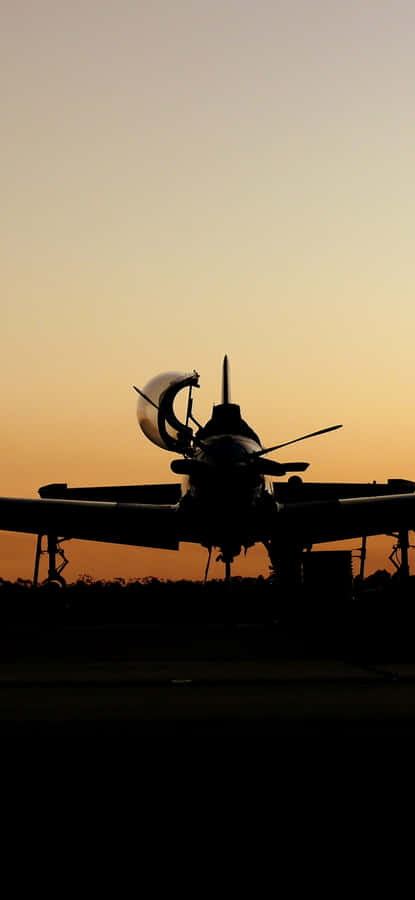 A Plane On The Runway Wallpaper