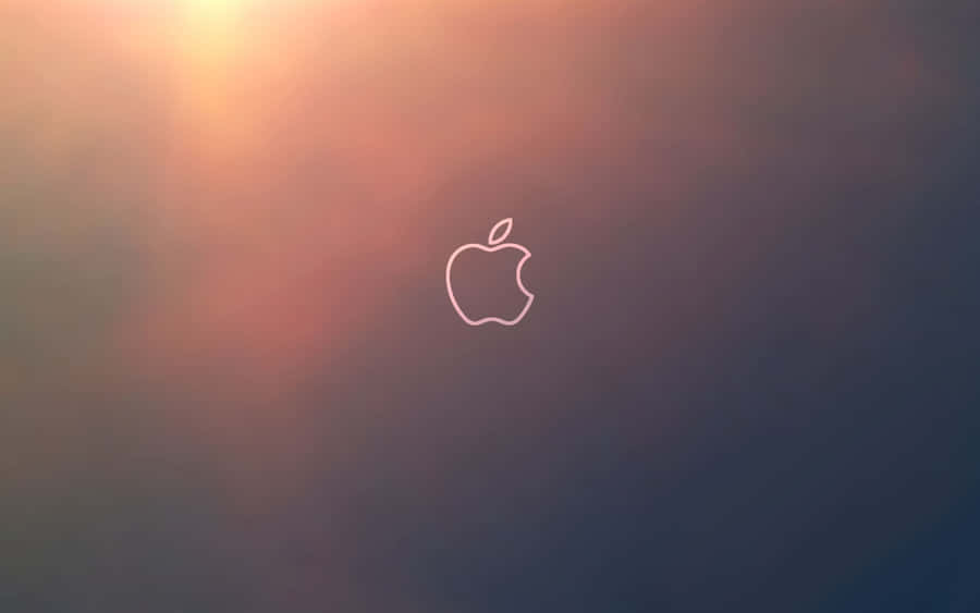 A Pristine Apple Desktop Computer - The Perfect Addition To Any Home Office Setup. Wallpaper