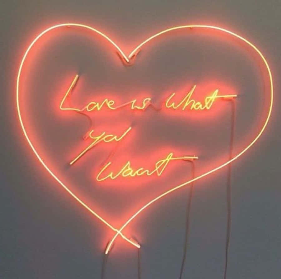 A Radiant Orange Heart Shines Bright Wallpaper