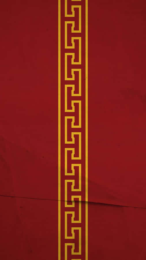 A Red And Yellow Pattern On A Red Background Wallpaper