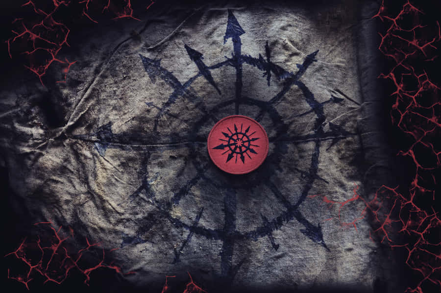A Red Compass With A Red Circle On It Wallpaper