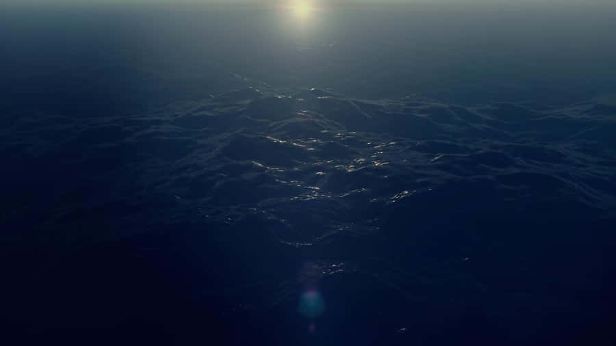 A River Surrounded By Lush Greenery And Breathtaking Natural Scenery. Wallpaper