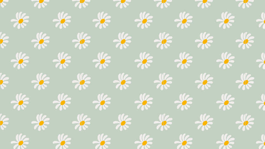 A Sage Green Laptop Sitting On A Desk Wallpaper