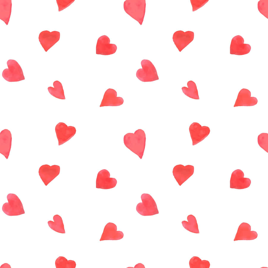 A Seamless Heart Pattern In Vibrant Red Shades Wallpaper
