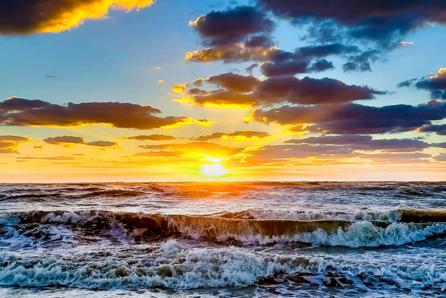 A Serene Winter Beach Scene Wallpaper