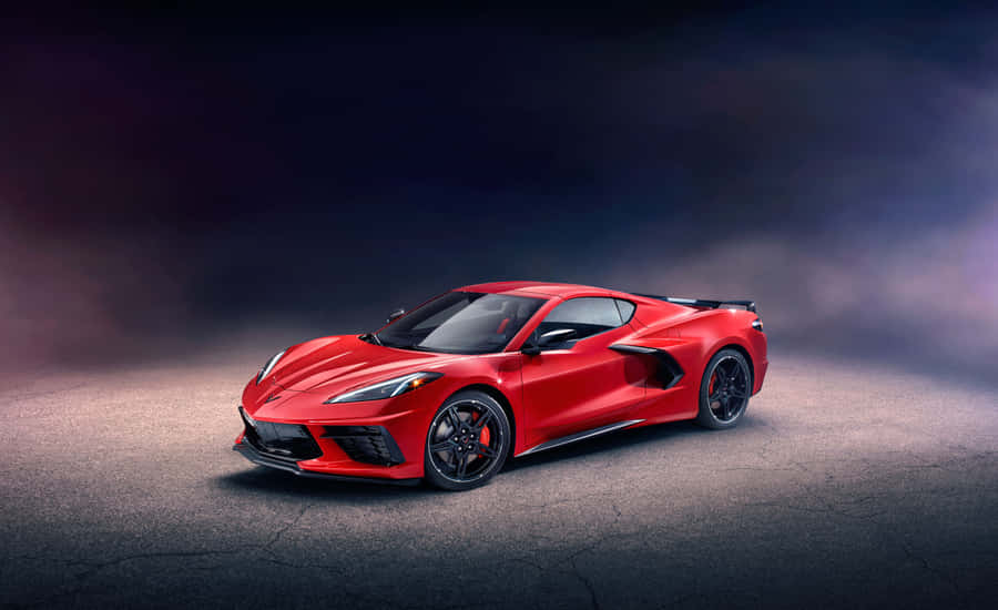 A Sleek Chevrolet Corvette Stingray In Stunning Red Wallpaper