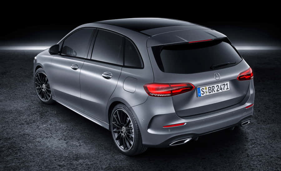 A Striking Mercedes Benz B-class Showcased Against A Stylish Backdrop Wallpaper