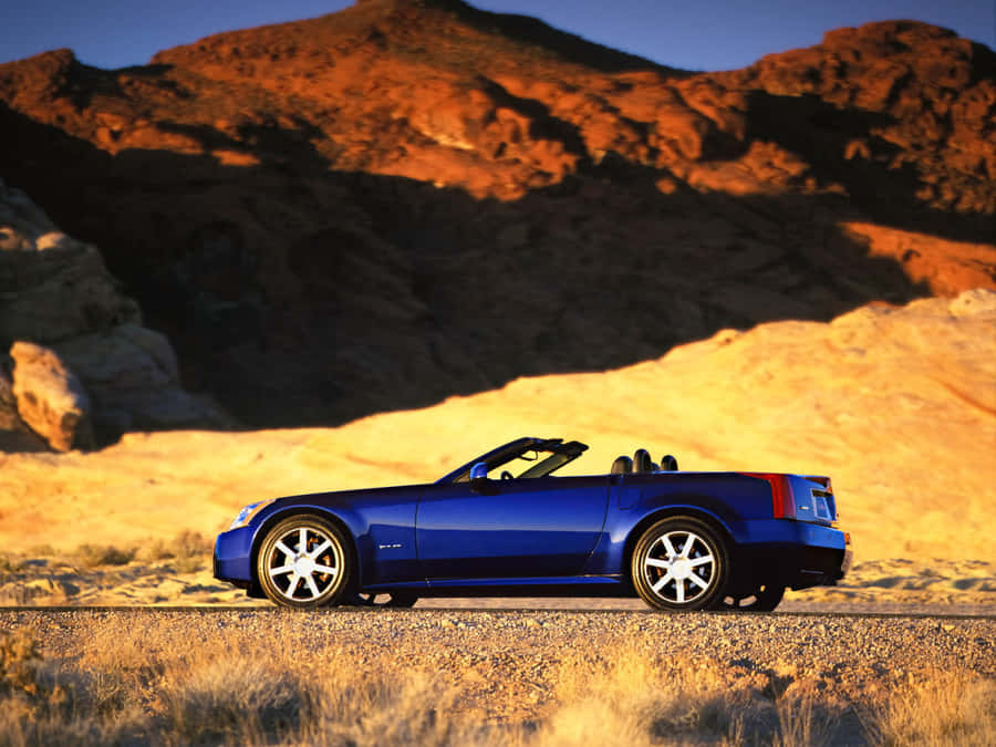 A Stunning Cadillac Xlr Cruising The Streets Wallpaper
