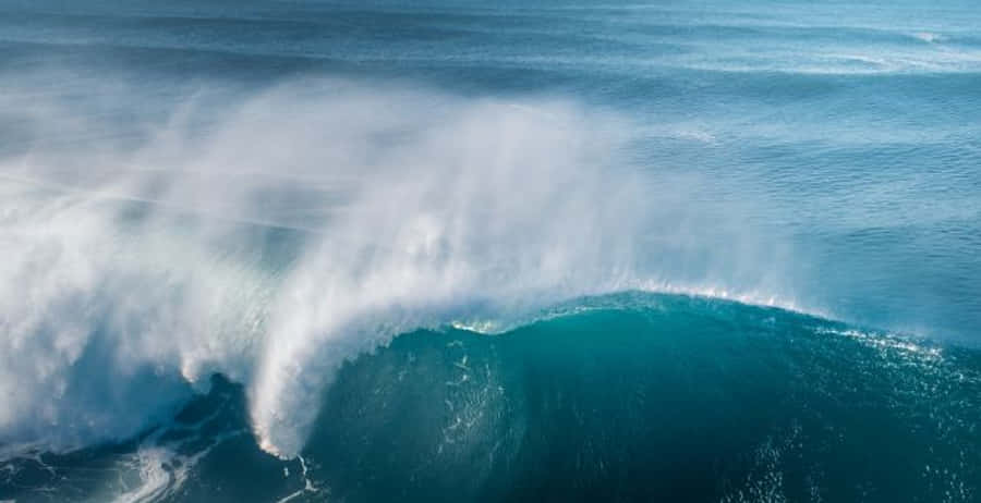 A Stunning High Tide At Sunset Wallpaper