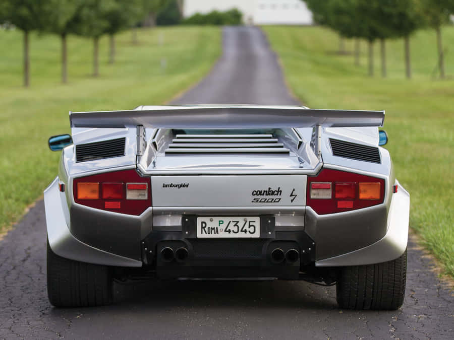 A Stunning Lamborghini Countach On The Road Wallpaper