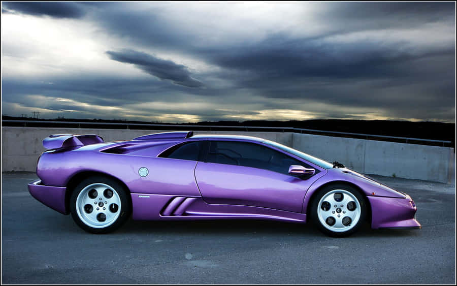 A Stunning Lamborghini Diablo In Vibrant Yellow Wallpaper