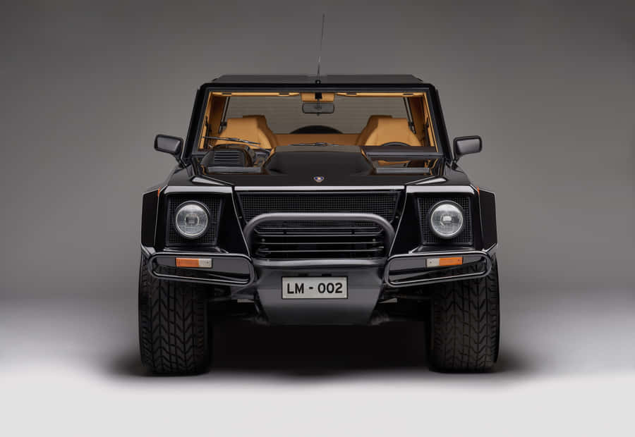 A Stunning Lamborghini Lm002 In Its Full Glory Wallpaper